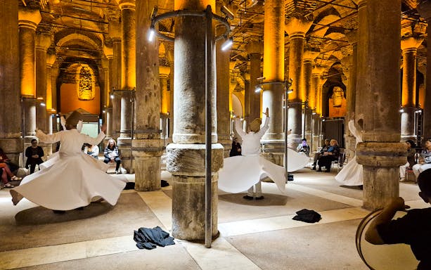 Whirling Dervish Ceremony in Istanbul's ancient columned hall.