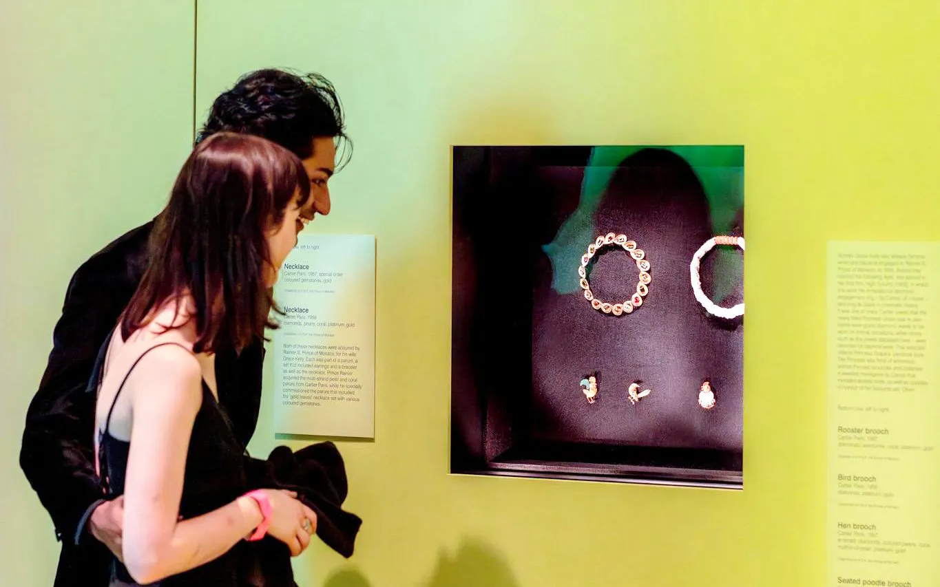 Visitors viewing Cartier jewelry display at NGV Friday Nights, National Gallery Victoria.