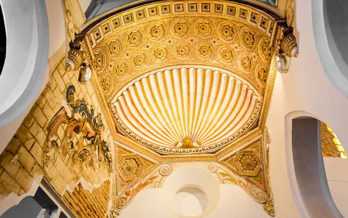 Ornate ceiling detail of Synagogue Santa Maria la Blanca in Toledo, Spain.