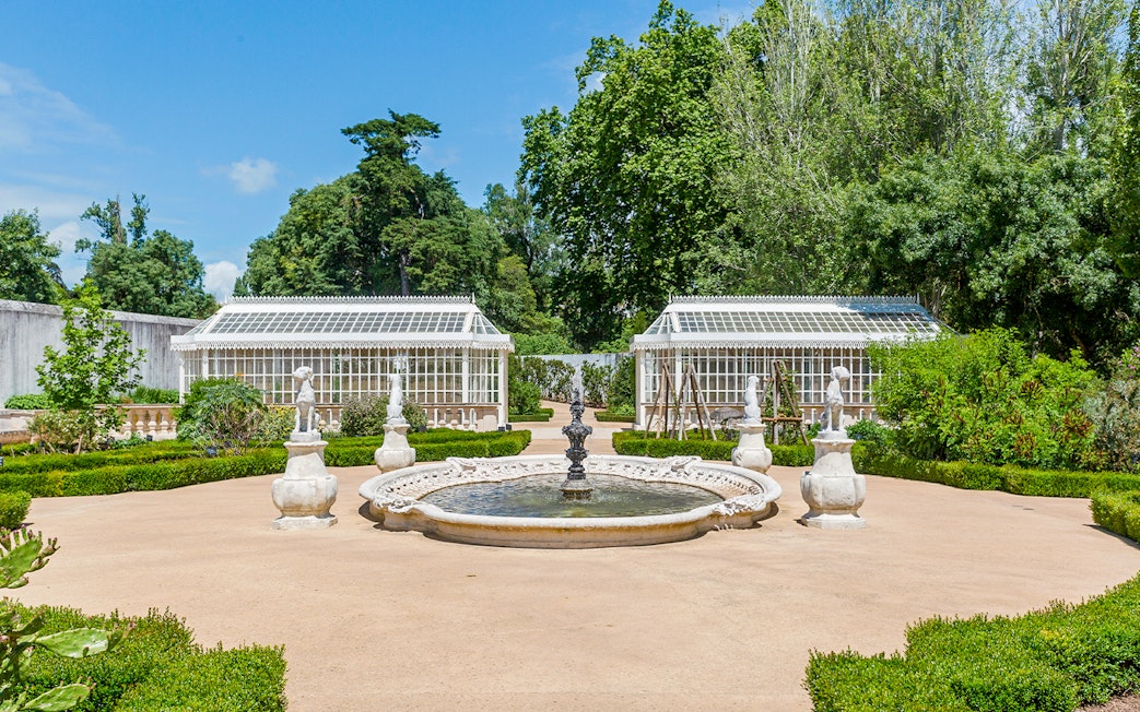 Fountain and statues in the National Palace of Queluz Botanical Garden, Portugal.