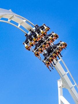 Roller coaster loop at Six Flags: Great Adventure with riders upside down.