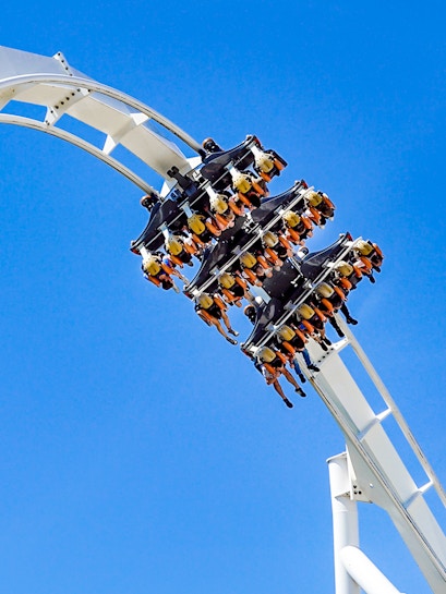 Roller coaster loop at Six Flags: Great Adventure with riders upside down.