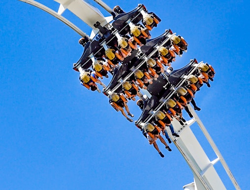 Roller coaster loop at Six Flags: Great Adventure with riders upside down.