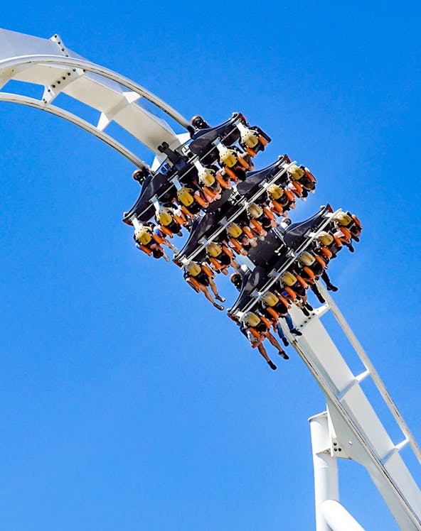Roller coaster loop at Six Flags: Great Adventure with riders upside down.