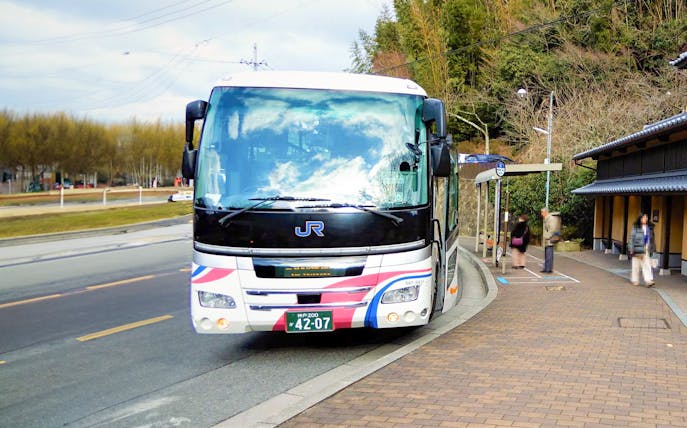 Bus at a stop for Arima Onsen round trip service from Kobe.