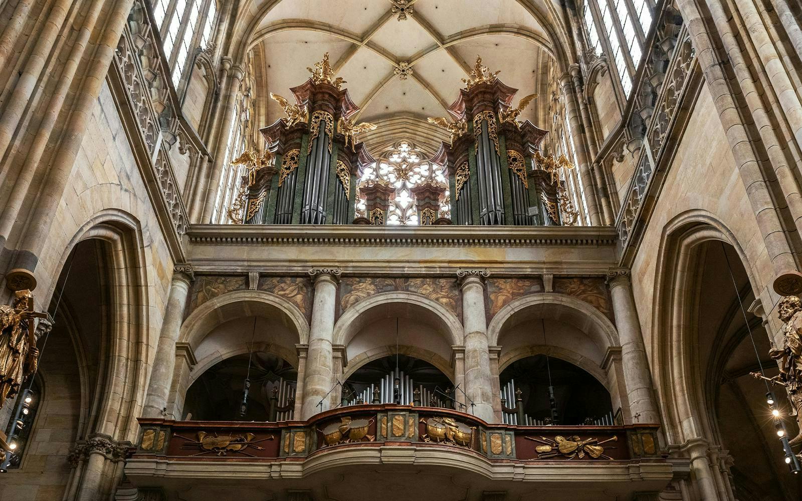 Organ pipes and ornate details inside St. Vitus Cathedral, Prague.