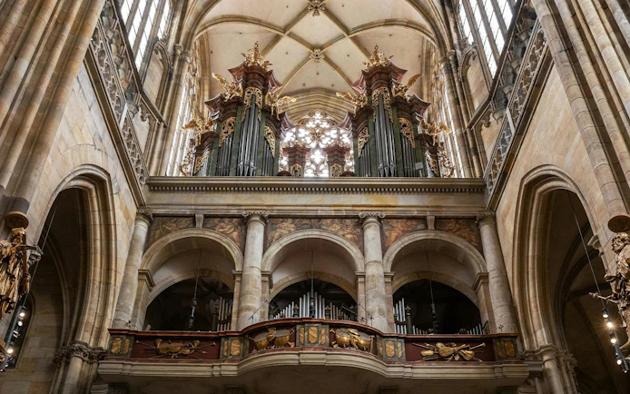 Organ pipes and ornate details inside St. Vitus Cathedral, Prague.