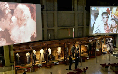 Costume displays and vintage film projections at the National Museum of Cinema, Turin.