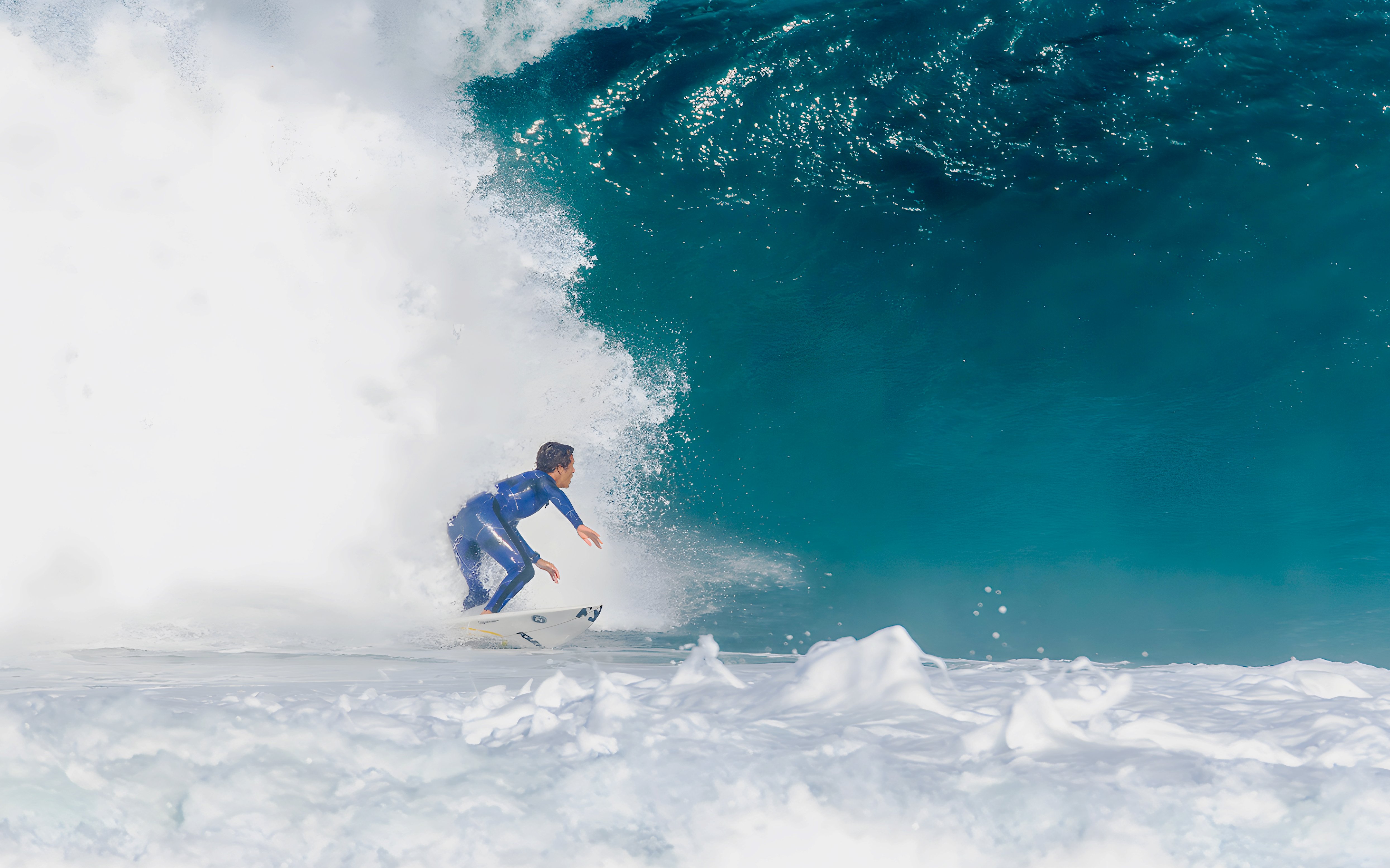 Instructor surfing large wave during class in Lisbon.