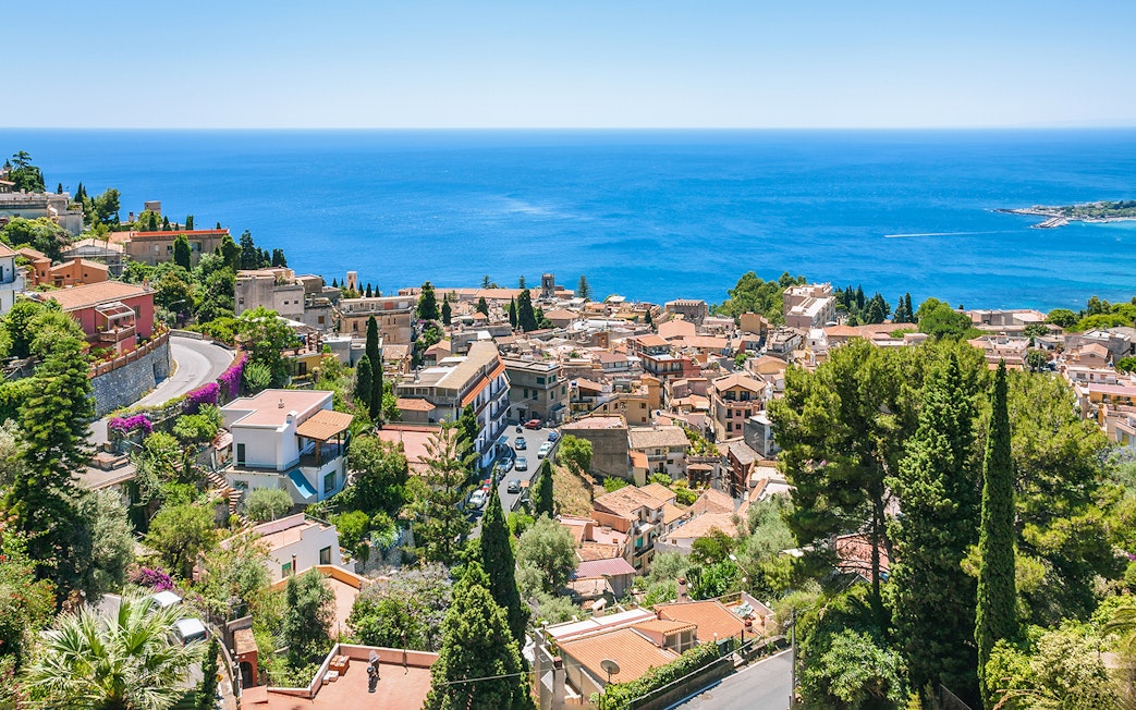Taormina townscape with sea view, seen from Messina to Taormina transfer route.