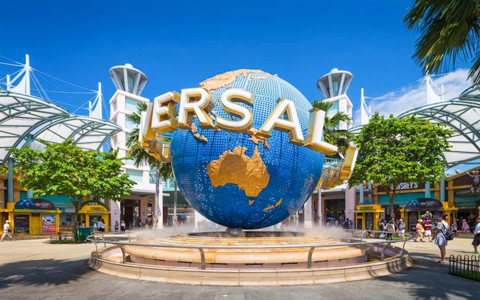 Universal Studios Singapore entrance with iconic globe sculpture.
