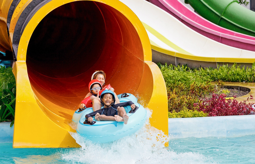 Exciting water slide at Caribe Aquatic Park in Barcelona, perfect for family day trips