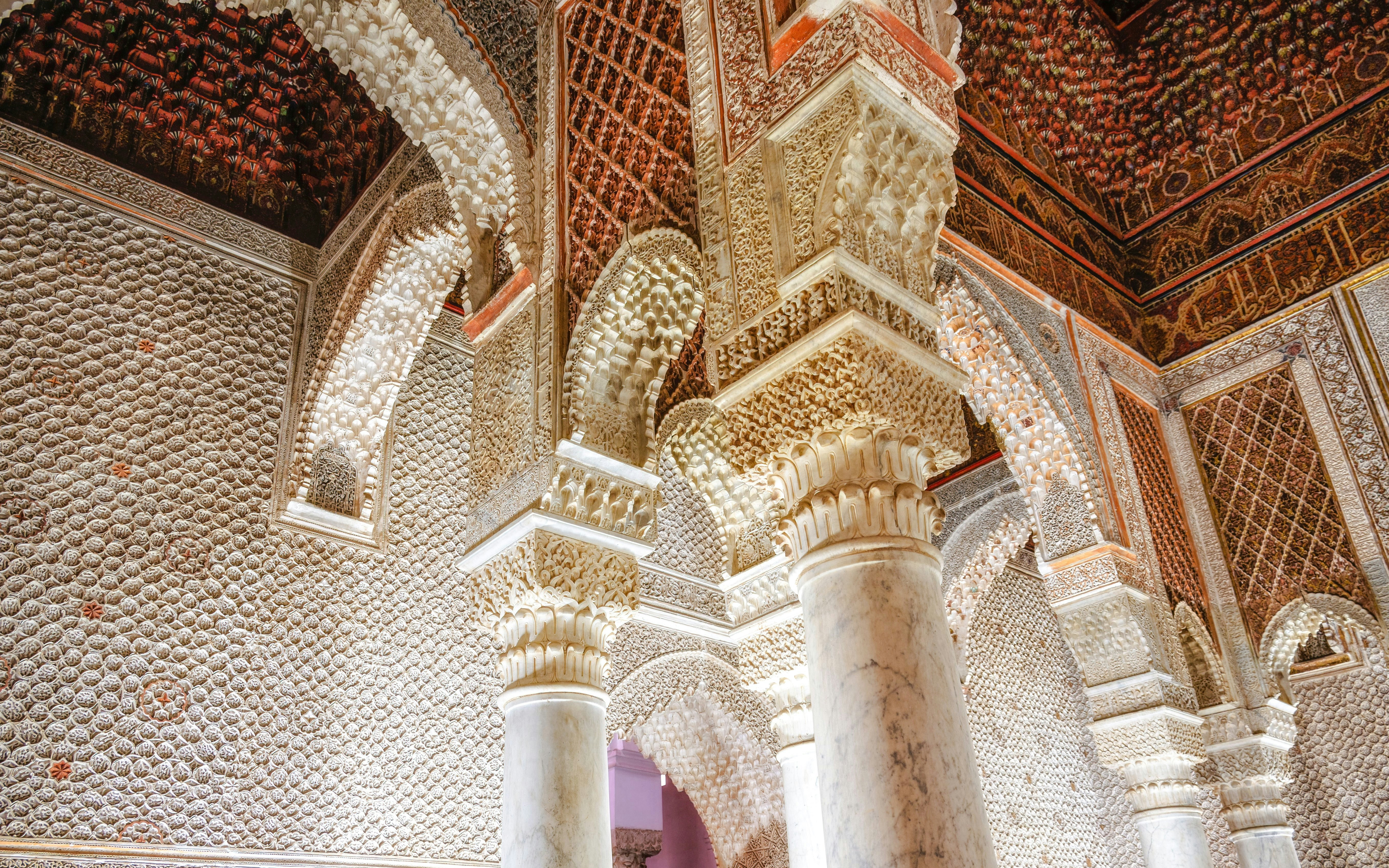 Intricate stucco and marble columns inside Saadian Tombs, Marrakech.