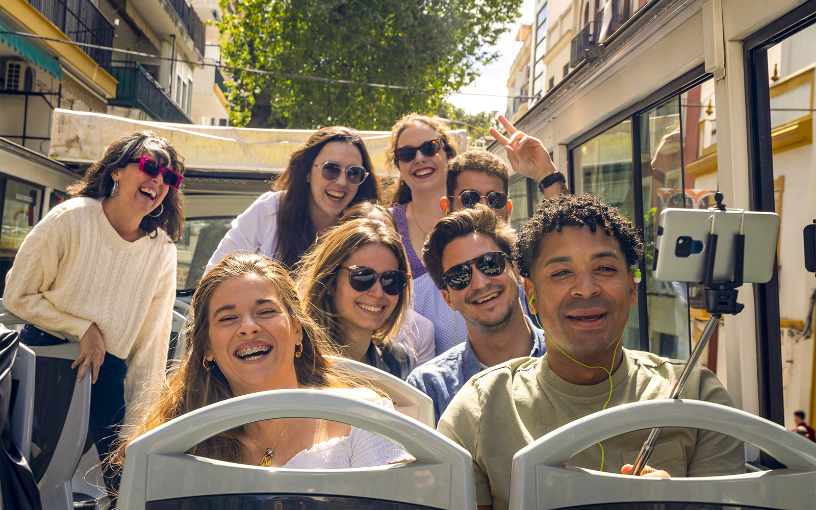 Group enjoying Sevirama Seville Hop-on Hop-off Bus Tour.