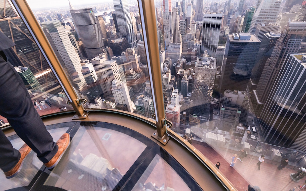 View from Top of the Rock observation deck overlooking New York City skyscrapers.