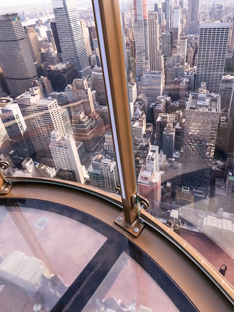 View from Top of the Rock observation deck overlooking New York City skyscrapers.