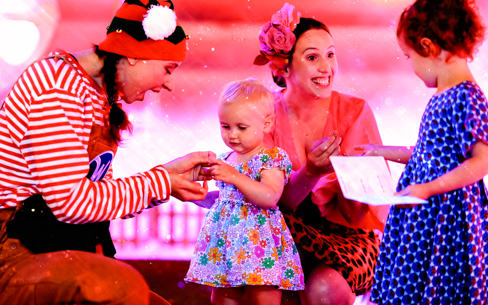 Santa's elf interacting with children at Wundrful World of Christmas event, Sydney.