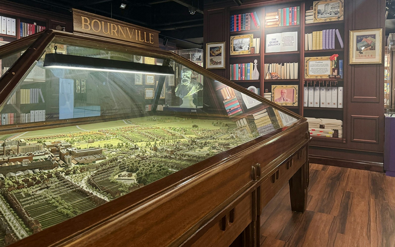 Model of Bourneville village at Cadbury World exhibit, showcasing historical layout and architecture.