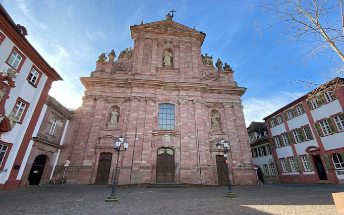 Heidelberg Jesuit Church facade in city exploration game setting.