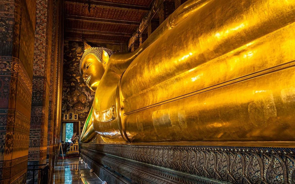 Reclining Buddha statue at Wat Pho, Bangkok, part of Grand Palace and temples tour.