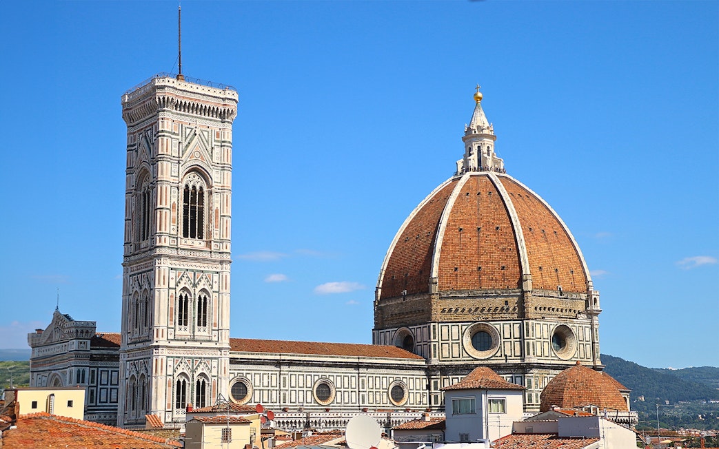 Florence Cathedral and Giotto's Campanile on a sunny day, Italy.