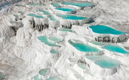 Natural pools and travertine terraces in Pamukkale, Turkey.