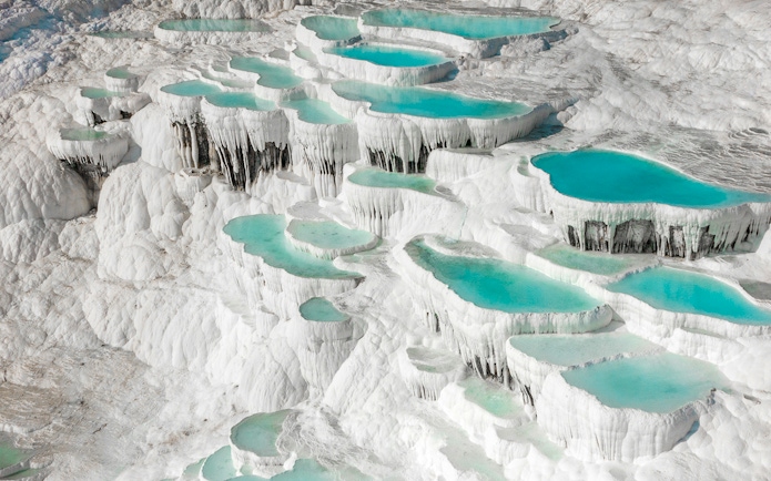 Natural pools and travertine terraces in Pamukkale, Turkey.