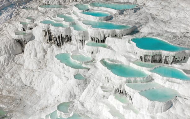 Natural pools and travertine terraces in Pamukkale, Turkey.