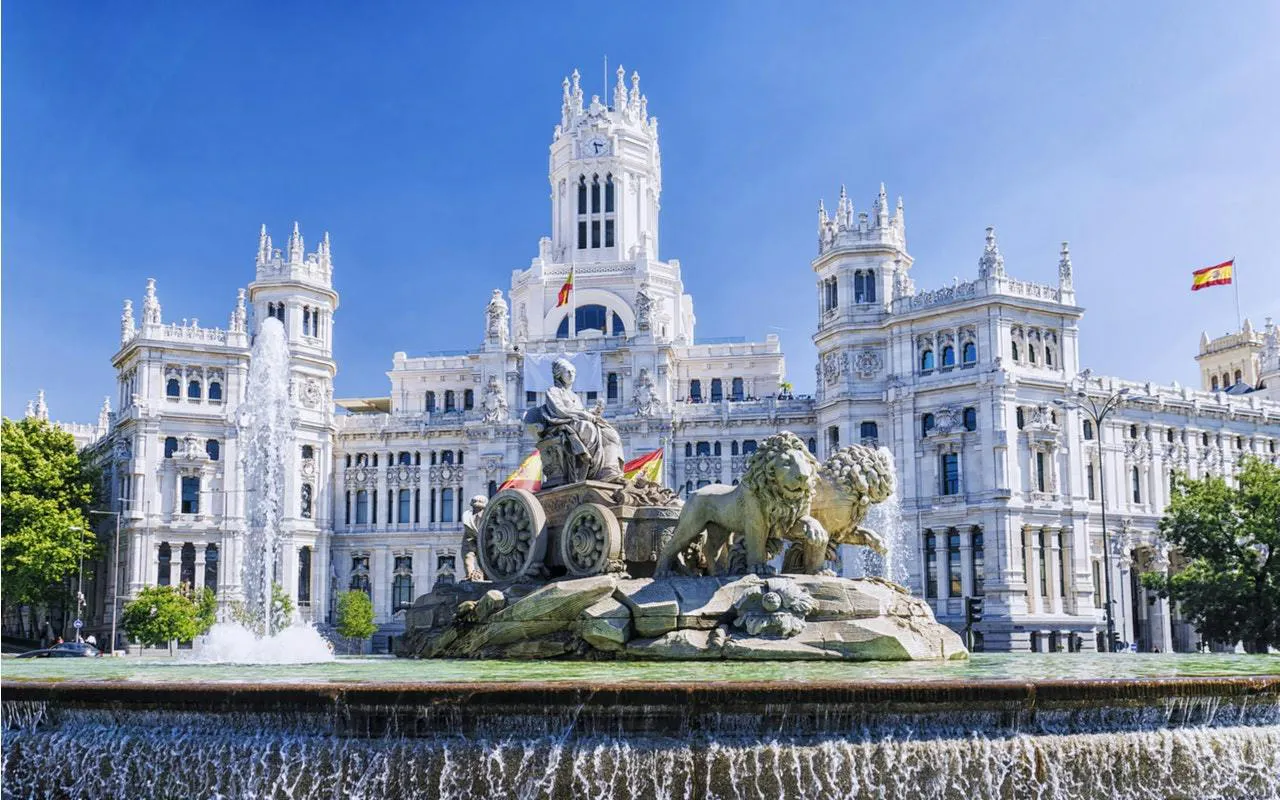 Cibeles Fountain and Palacio de Cibeles in Madrid, part of self-guided city exploration game.