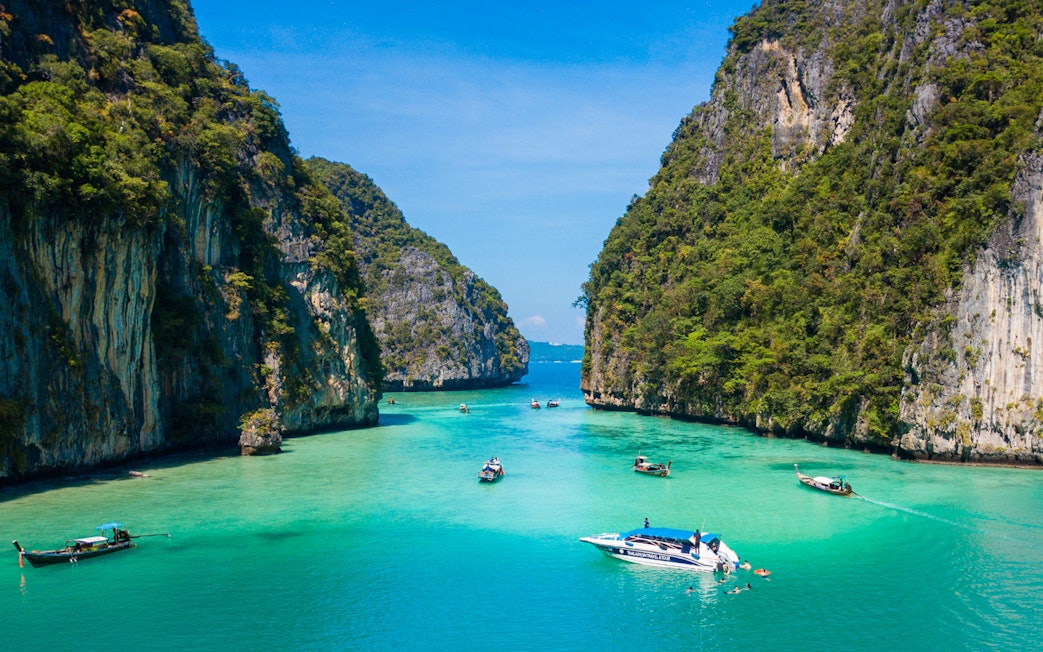 Aerial view of boats in turquoise waters at Maya Bay, Pileh Lagoon, Phi Phi Island.