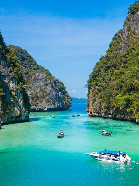 Aerial view of boats in turquoise waters at Maya Bay, Pileh Lagoon, Phi Phi Island.