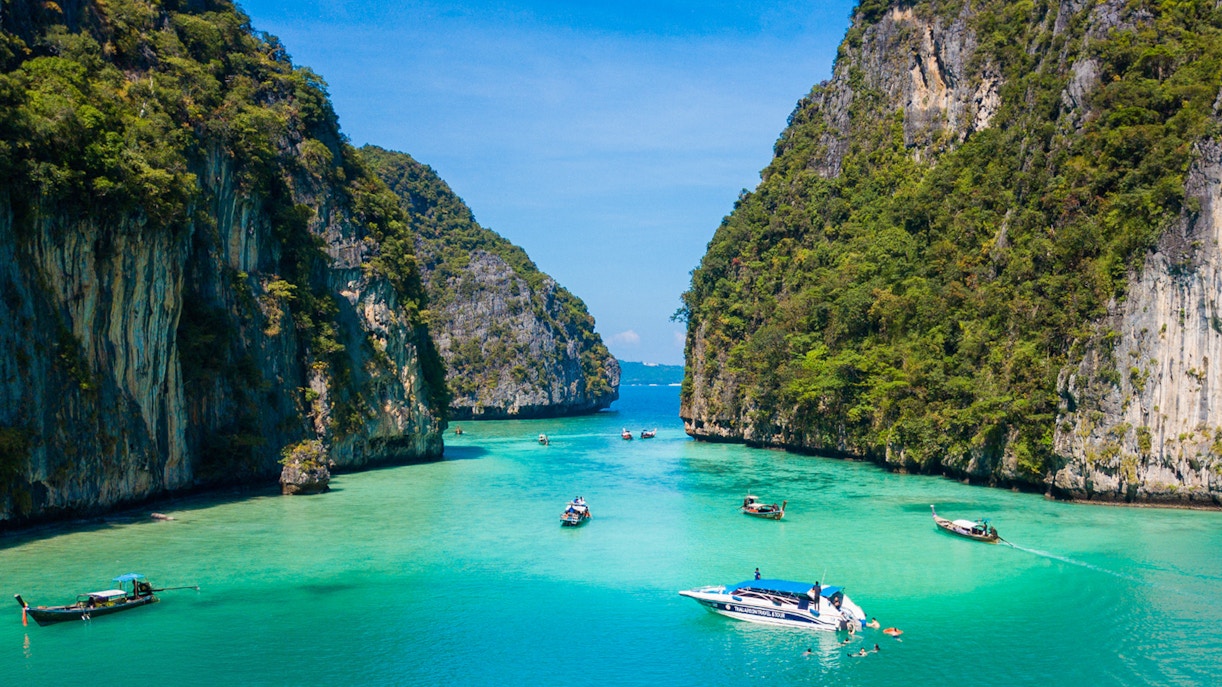Aerial view of boats in turquoise waters at Maya Bay, Pileh Lagoon, Phi Phi Island.