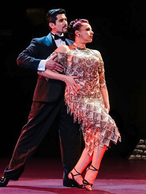 Tango dancers performing at Tango Porteño Show in Buenos Aires.