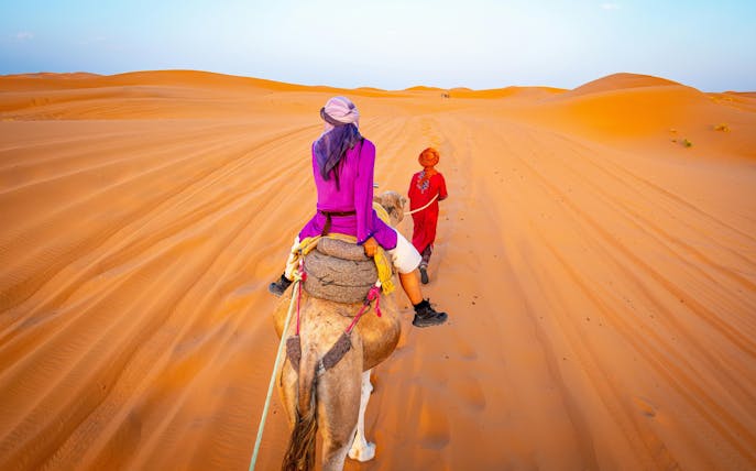 Camel ride through the Sahara Desert dunes.