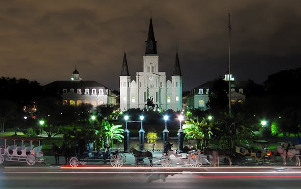 St. Louis Cathedral and Jackson Square illuminated at night, New Orleans.