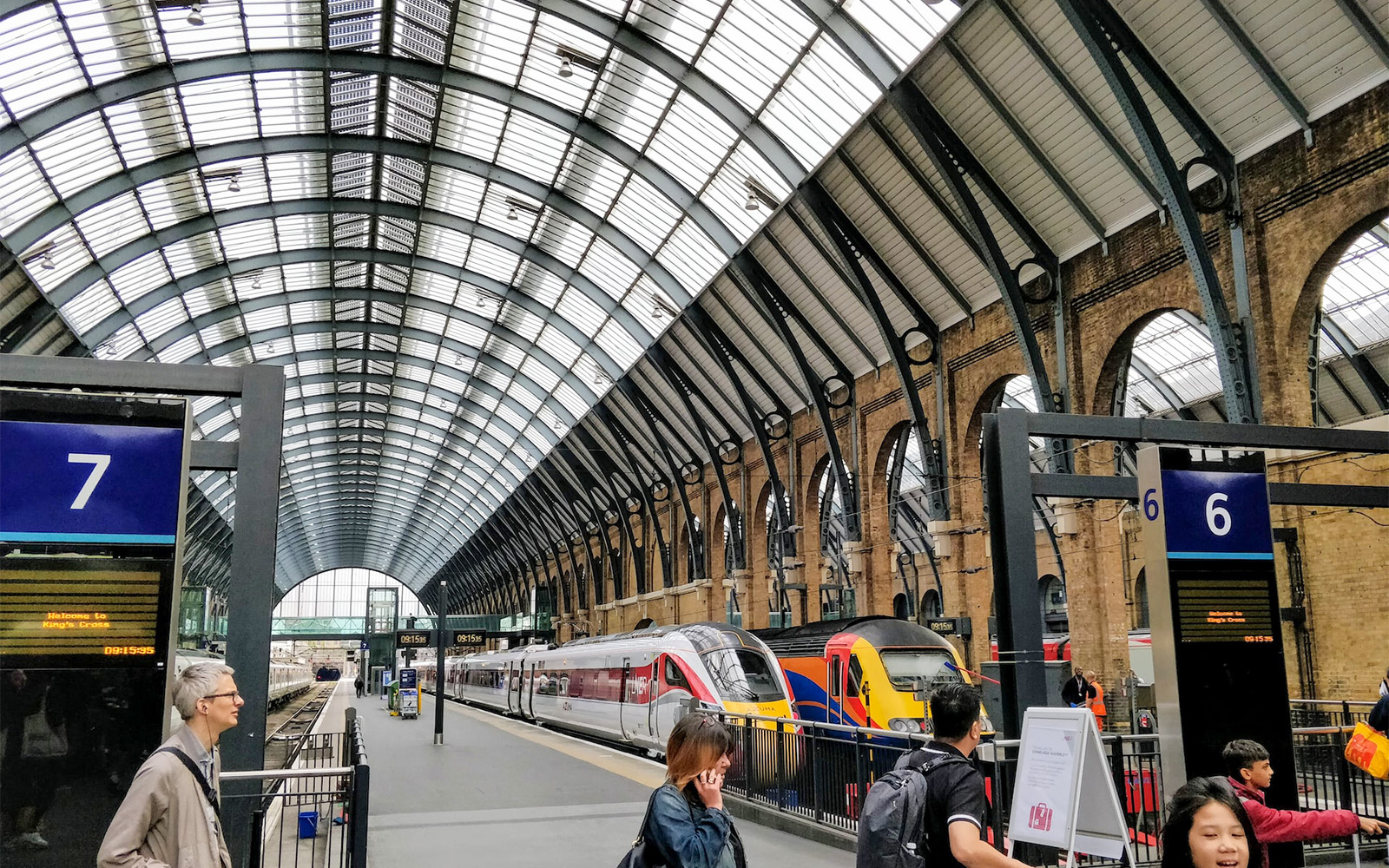 Train platforms at King's Cross Station, London, a key transit point to Kew Gardens.