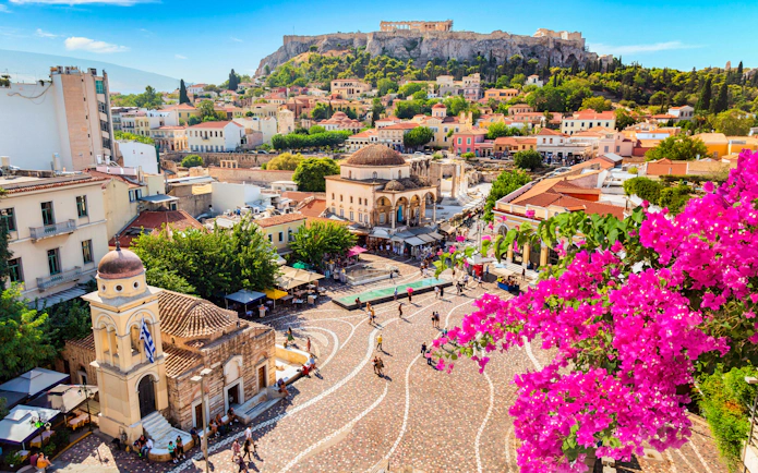 Monastiraki Square with Church of Pantanassa and Acropolis Hill in Athens, Greece.