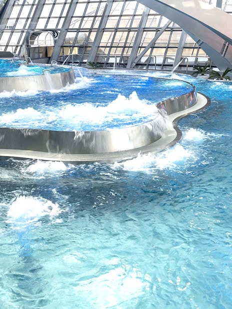 Thermal pools with modern architecture at Caldea spa complex, Andorra.