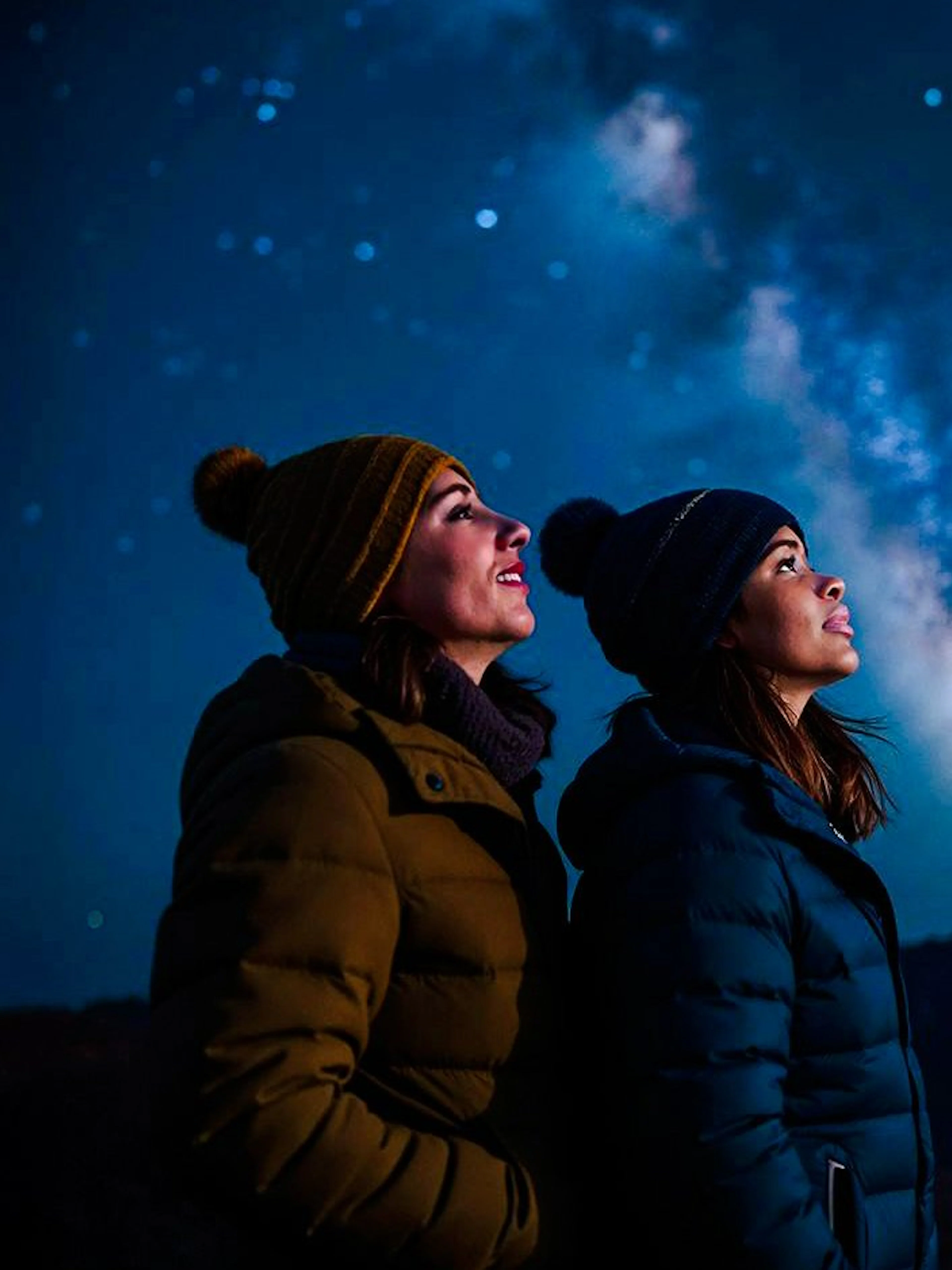 Guests stargazing at night sky on Mount Teide, Tenerife.