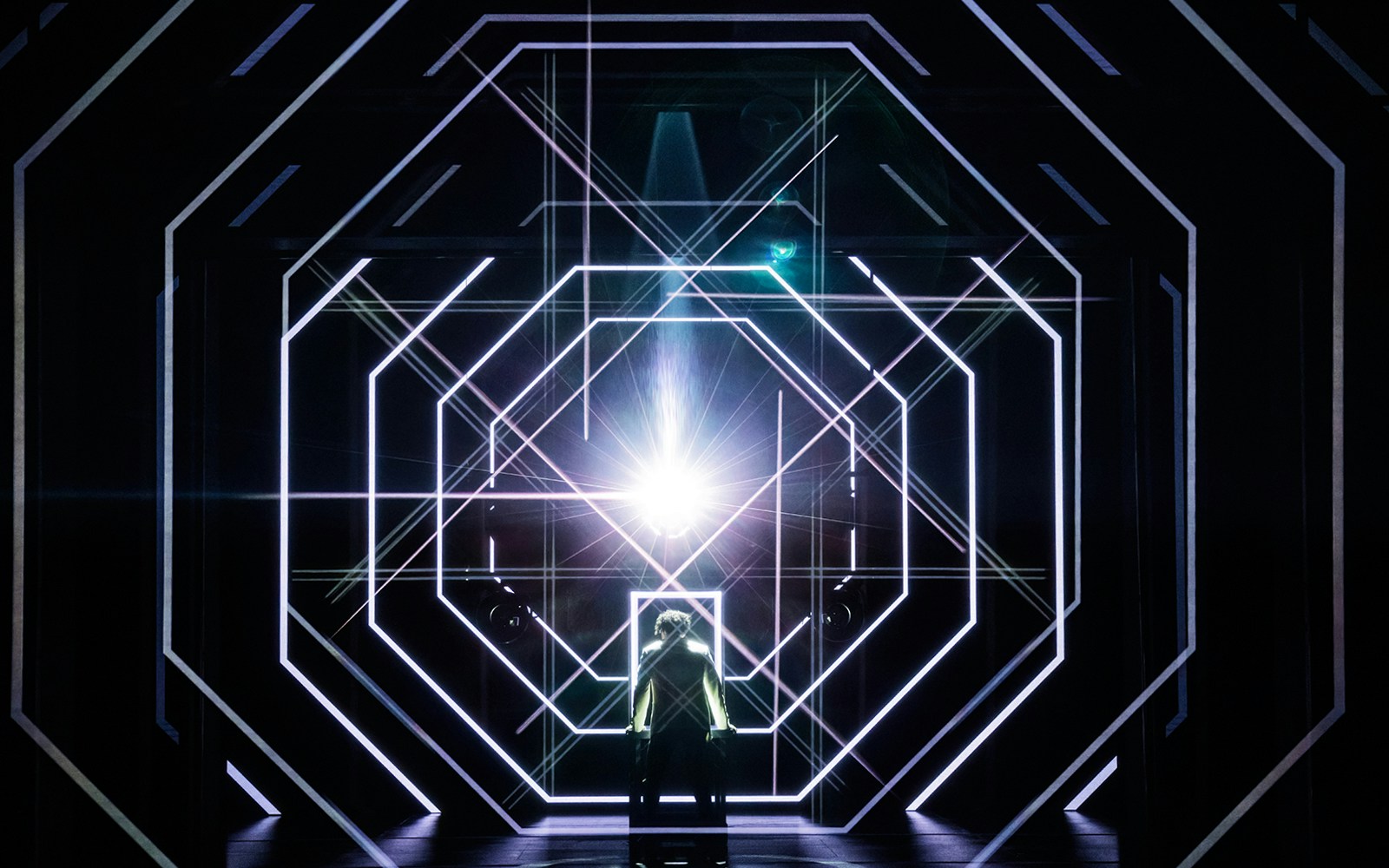 Stage set design for The Who’s Tommy with geometric light patterns.