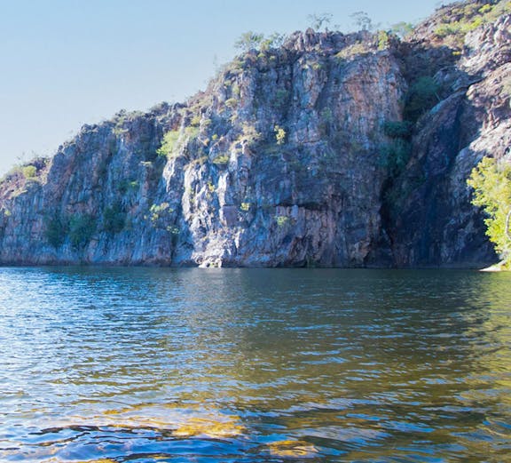 Katherine Gorge cliffside view with calm water in Nitmiluk National Park, Australia.