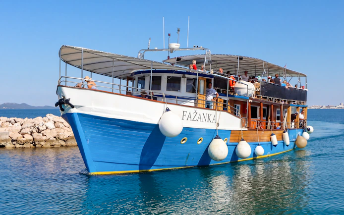 Boat Franzka departing from Zadar, Croatia with passengers on deck.