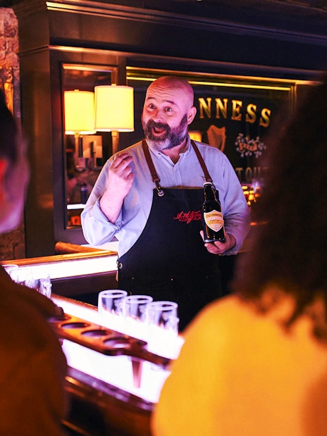 Guinness expert leading a tasting session at the Guinness Connoisseur Experience in Dublin.