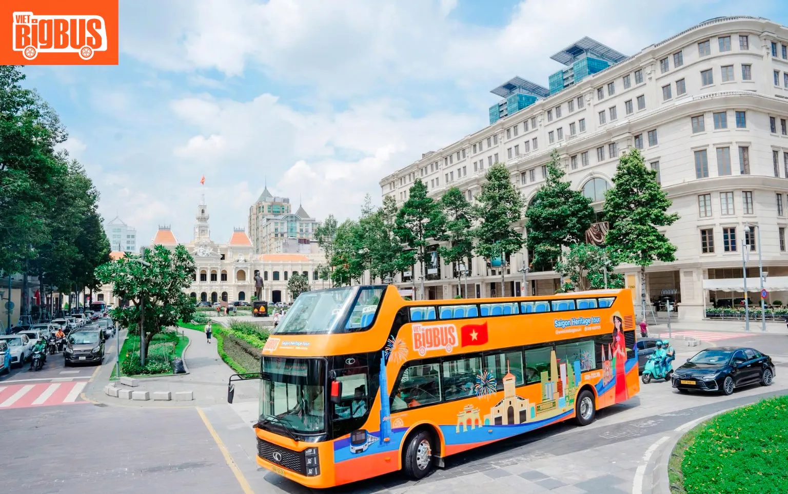 Open-top tour bus in front of Ho Chi Minh City Hall on Heritage Sightseeing Loop.