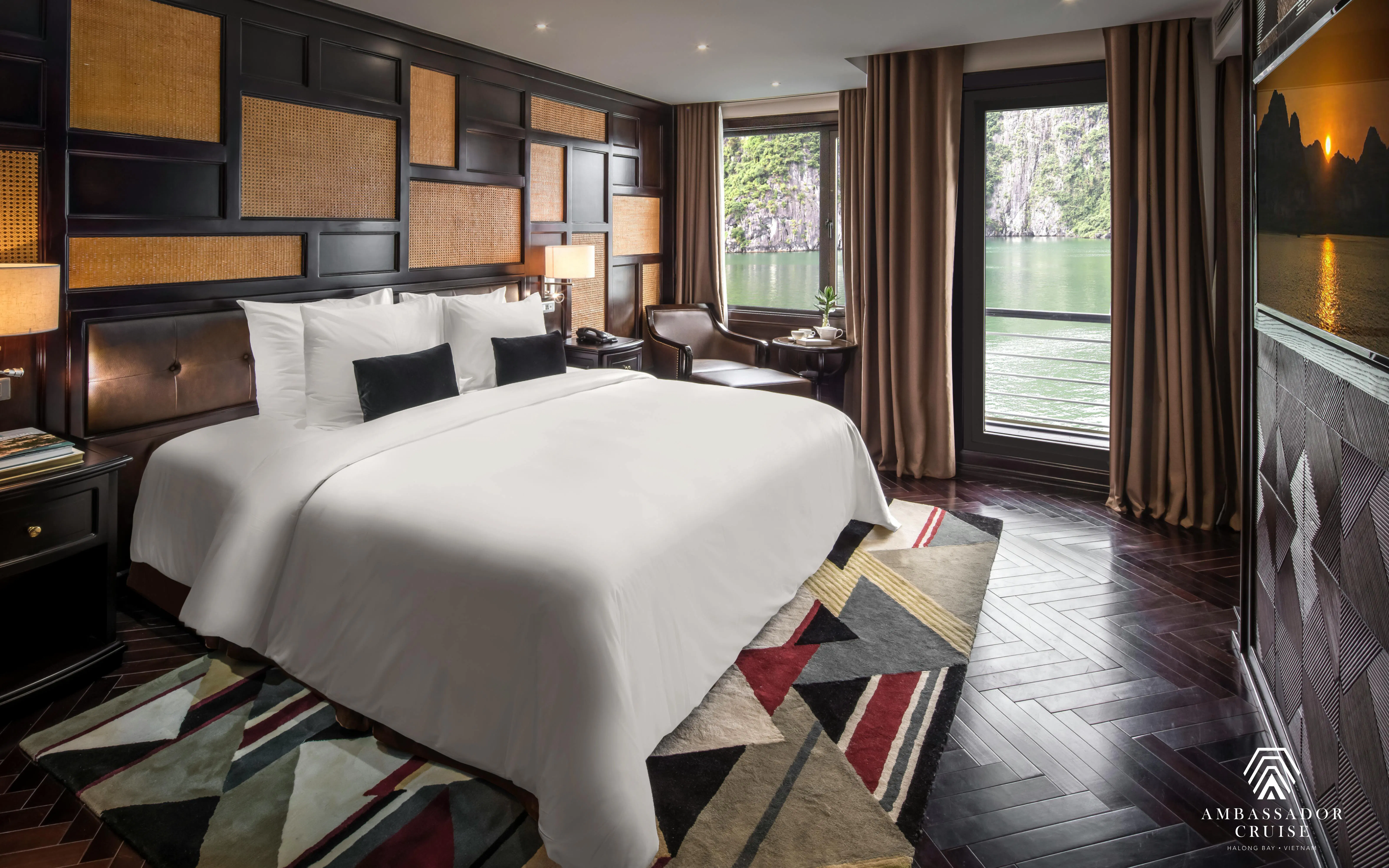 Luxury cabin with a view of Ha Long Bay on a 5-star Ambassador Cruise.