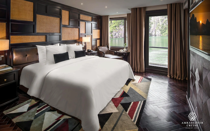 Luxury cabin with a view of Ha Long Bay on a 5-star Ambassador Cruise.