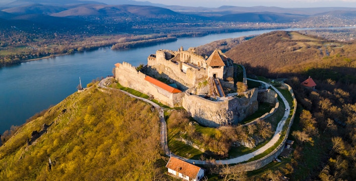 Aerial view of Visegrad Castle overlooking the Danube River in Hungary.