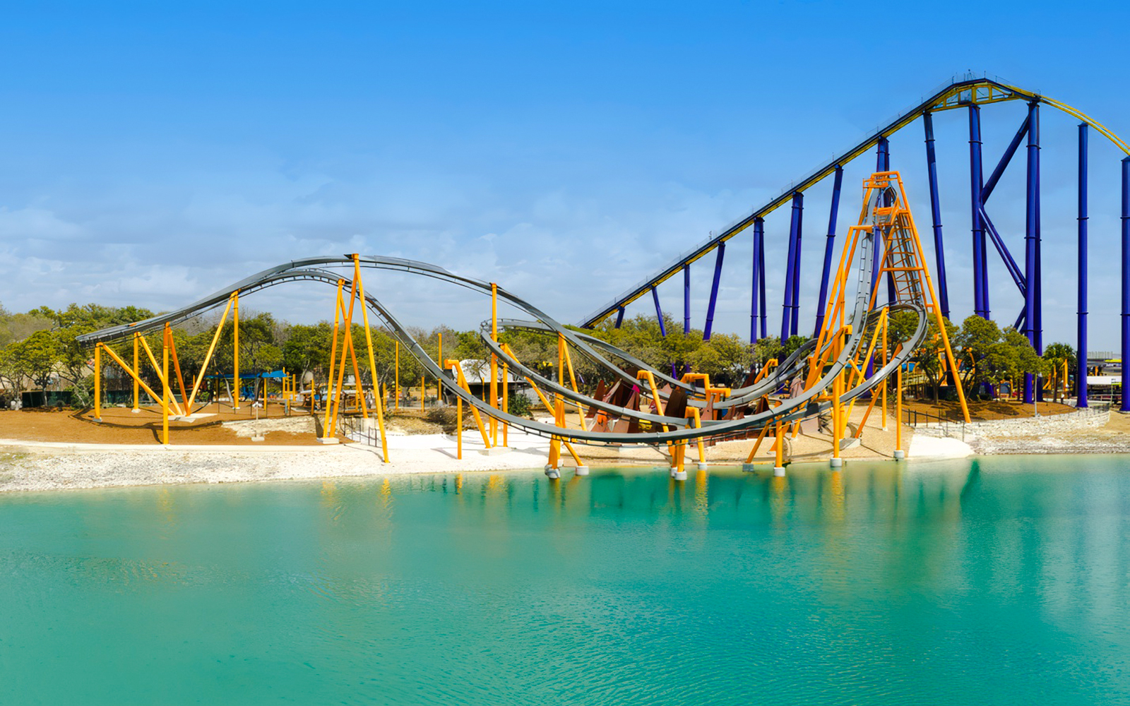 Barracuda Strike roller coaster over water at SeaWorld San Antonio.