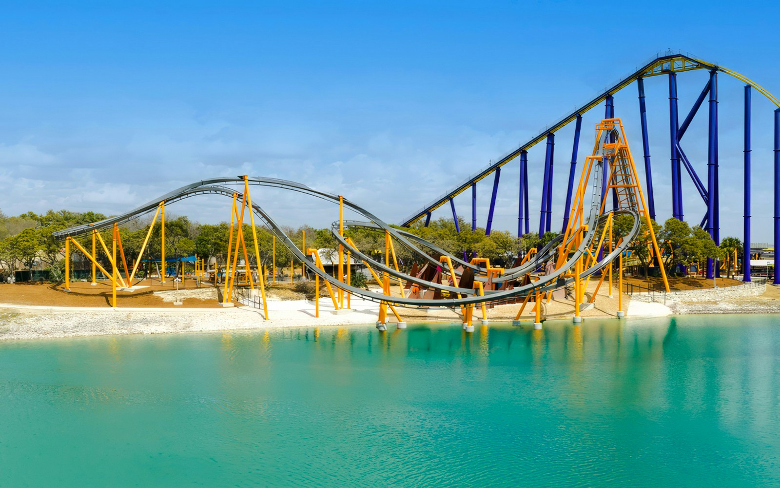 Barracuda Strike roller coaster over water at SeaWorld San Antonio.