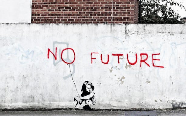 Graffiti of "No Future" with a child holding a balloon on a wall, related to The Little Prince Exhibition.
